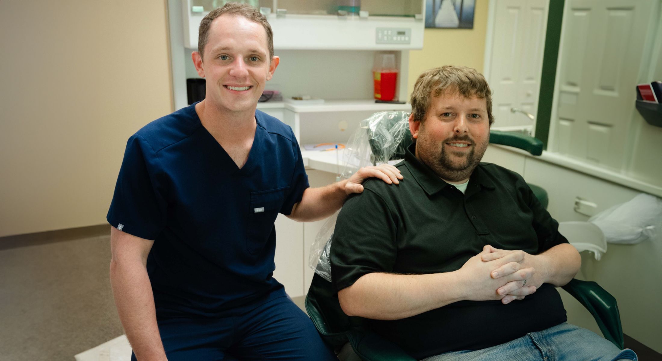 root canal therapy patient model sitting with madison dentist dr paul wehner