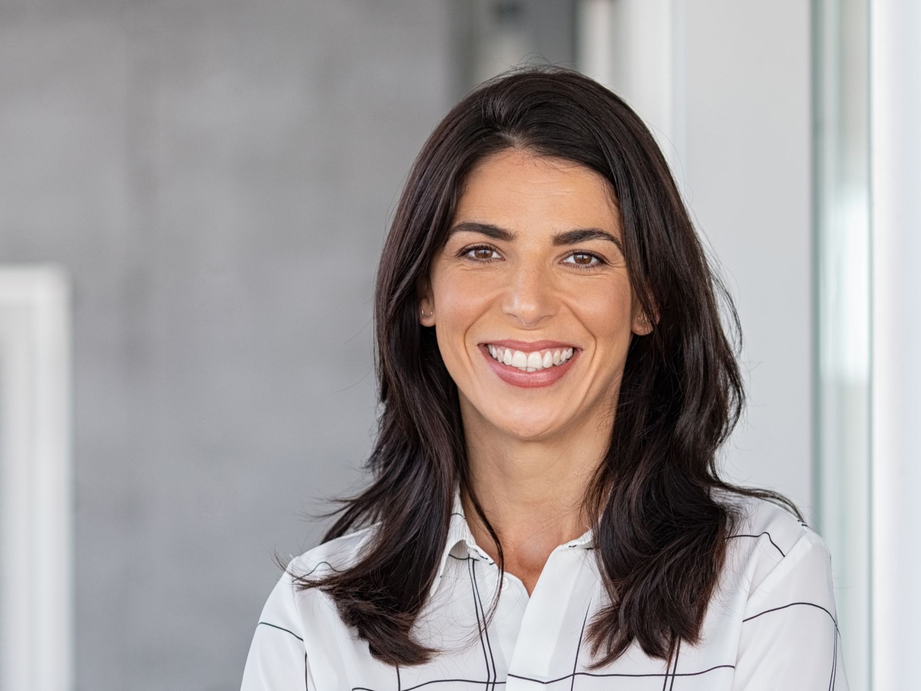 madison dentist patient model smiling with dark hair